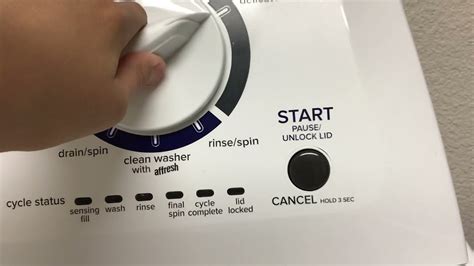 Turn the agitator (plastic stick in the middle of the washer) anticlockwise to open the top. . How to reset amana top load washer